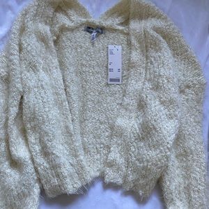 Urban Outfitters size XS fits more a medium unless you want the oversized look